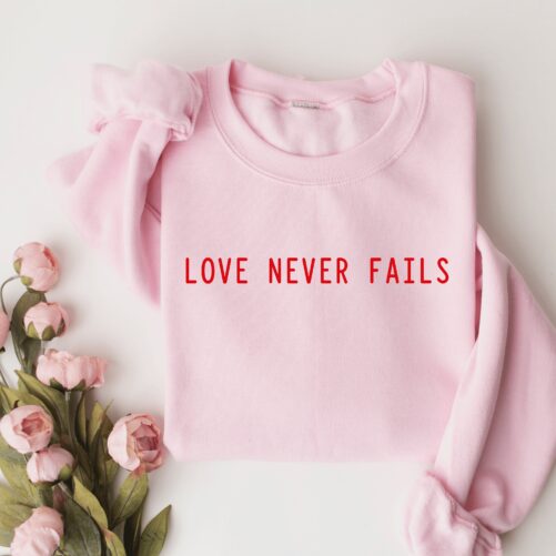 Love Never Fails Sweatshirt/Pink