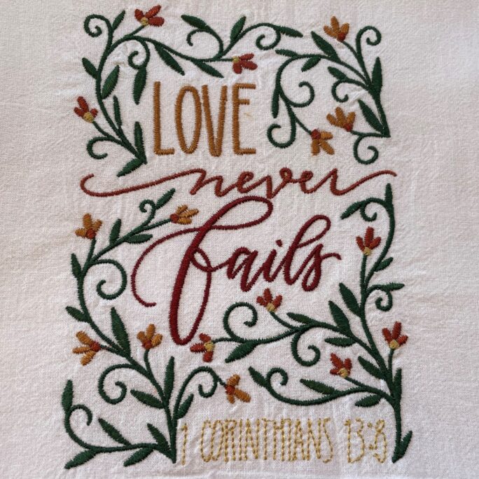 Embroidered Flour Sack Tea Towel in Fall Colors, Love Never Fails, Bible Verse, Christian Gift Under 20, Dish