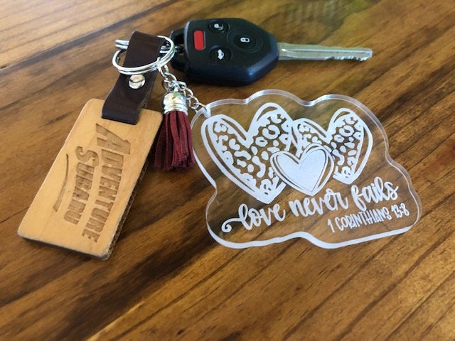 Love . Never Fails Keychain Tag