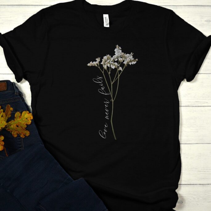 Love Never Fails Christian Bible Verse Flower Tee Shirt