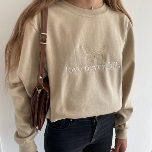Love Never Fails Christian Embroidered Sweatshirt Jesus Pullover Apparel Faith