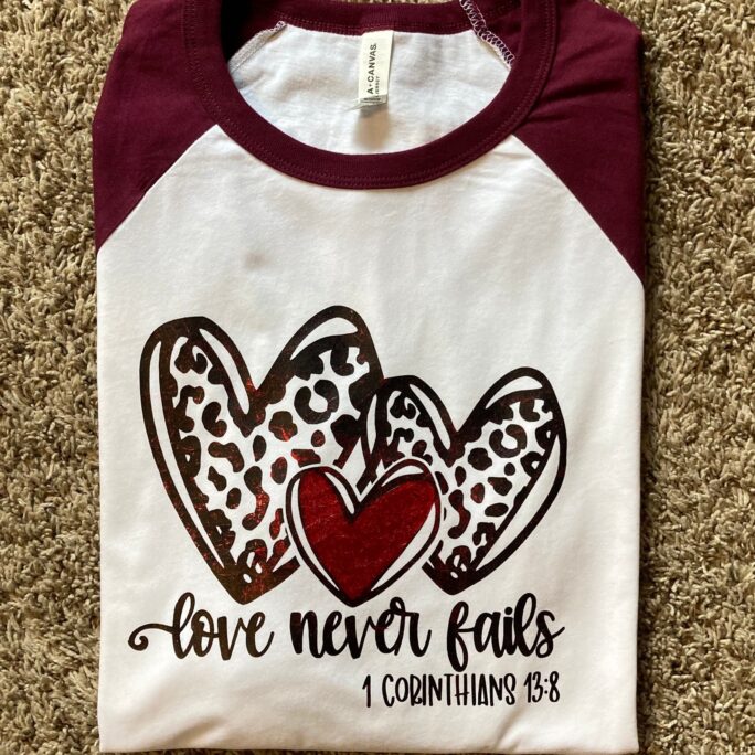 Love Never Fails Iron-On Vinyl Valentine Shirt