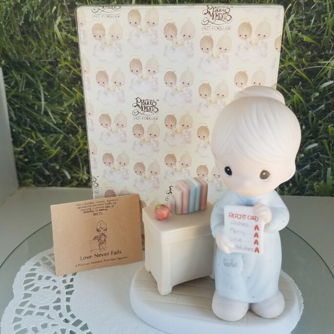 Love Never Fails Precious Moments Figurine